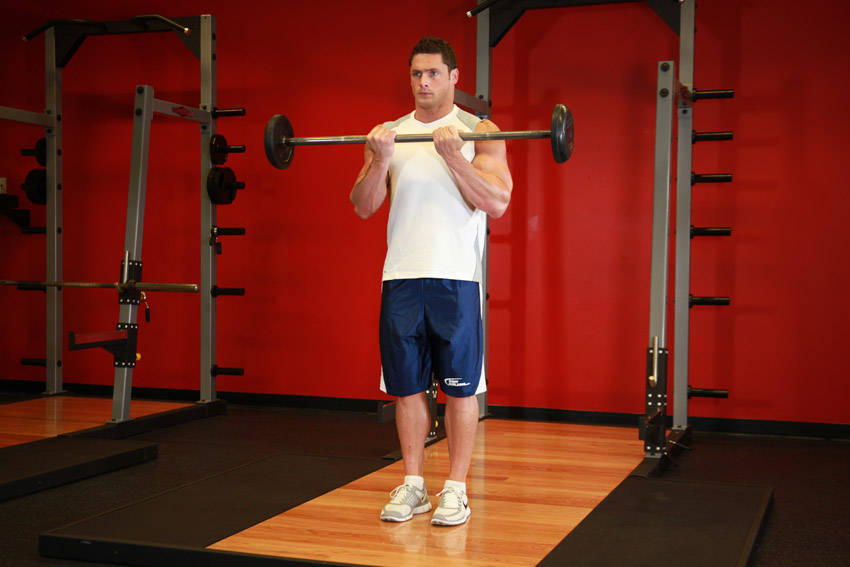 Close-Grip Standing Barbell Curl start and end position