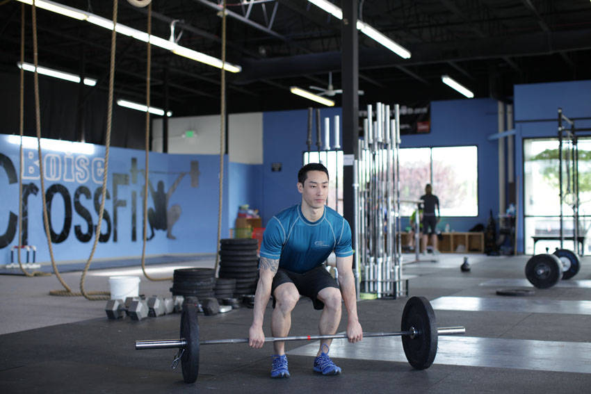 Dumbbell Clean and Press start and end position