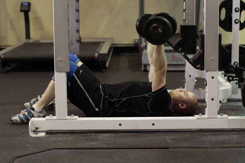 Dumbbell Floor Press start and end position