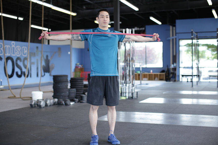 Resistance Band Pull-Apart start and end position