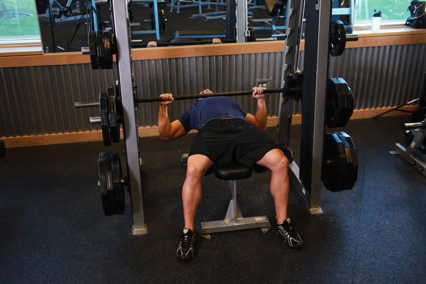 Smith Machine Bench Press start and end position