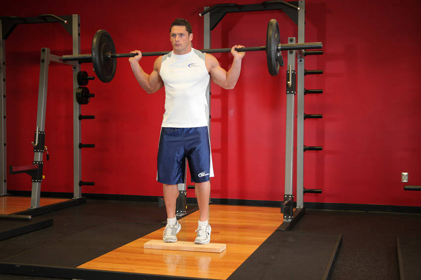 Standing Barbell Calf Raise start and end position