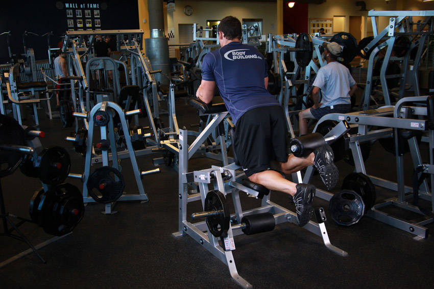 Standing Machine Leg Curl start and end position