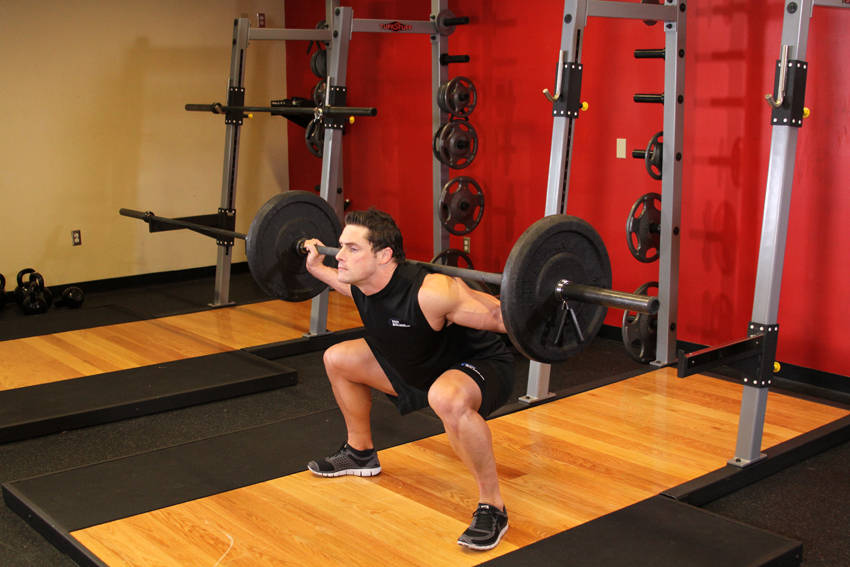 Wide Stance Barbell Squat start and end position